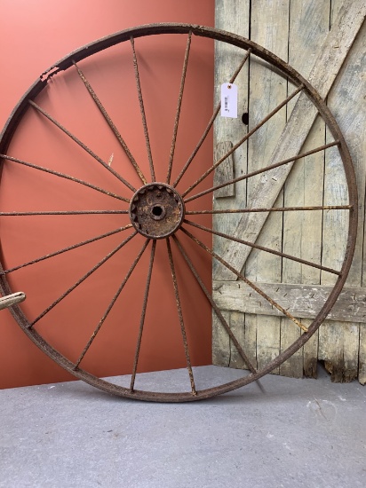 Large rustic metal wheel
