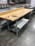 Formica prep table with broken tip of one leg