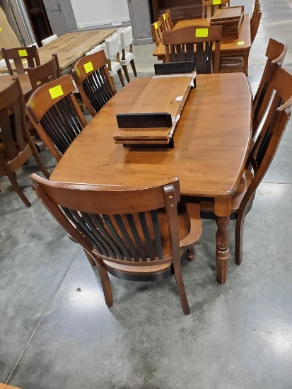 brown maple table w/4 sides, 2 arms, 2 leaves 66x43