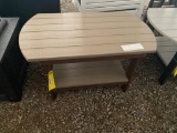 BROWN AND TAN POLY OVAL COFFEE TABLE