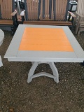 GREY AND ORANGE POLY TABLE