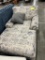 BLUE/TAN PATTERNED LOUNGE CHAIR