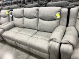 LIGHT GRAY LEATHER RECLINING SOFA