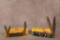 Two Kissing Crane knives, Two Blade Trapper & Abalone Stockman