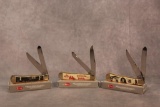 Three Case XX Natural Bone Trappers with Etched Handles