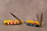 Two Kissing Crane knives, Two Blade Trapper & 2012 Merry Christmas Knife