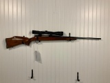 WETHERBY MO. DELUXE VANGUARD. 30-06 CAL W/SCOPE