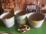 metal buckets and horseshoes