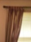 Pair of Window treatment with gold colored rod