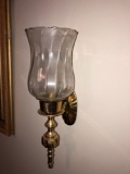 Pair of brass candle sconces with hurricane globe