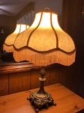 Heavy brass lamp with fringed shade