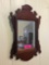 Small wood Chippendale style mirror