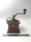 Early coffee grinder with till