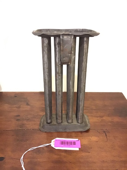 Antique pewter candle mold