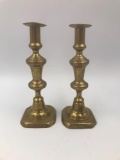 Early 1800s brass push-up candlesticks