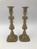 Early brass push-up candle sticks 1890 to 1920