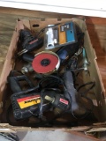 Box of assorted power tools