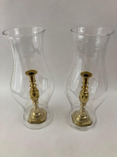 Pair of brass push up candle stick holders with hurricane globes