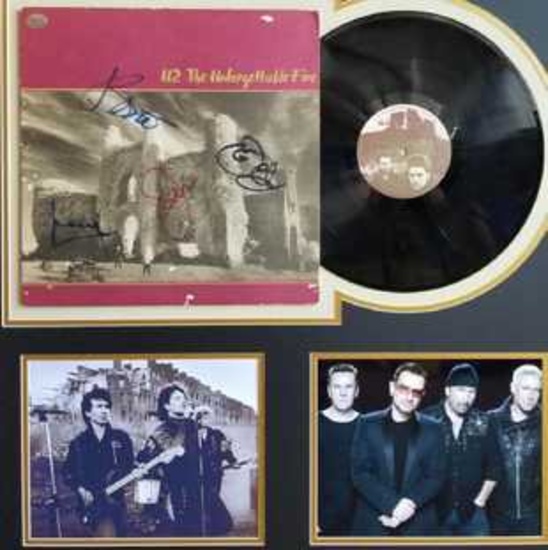 U2 HAND SIGNED RECORD WITH COA