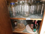 Lot of Items in Cabinet at Side window