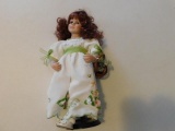 Doll with White/Green Dress and Flower Basket