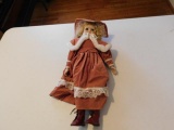 Doll with Hat and Red Dress
