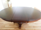 Kuolin Oval Dining Room Table with One Leaf