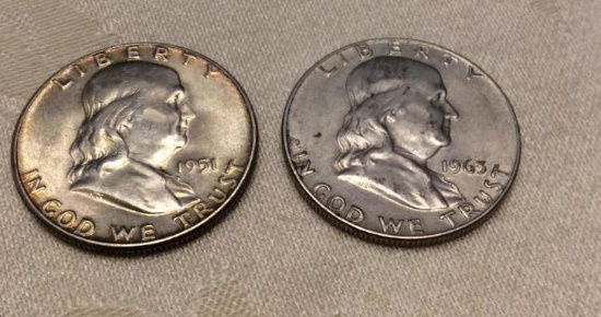 Two Silver Franklin Half Dollars