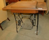 SINGER SEWING MACHINE AND CABINET