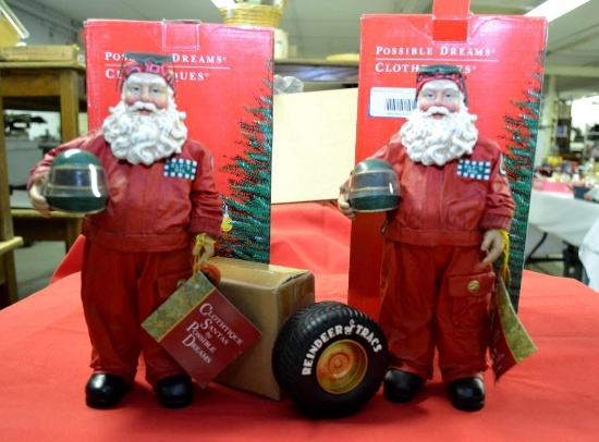 LOT OF 2 CLOTHTIQUES SANTA CLAUS RACING FIGURINES IN BOXES