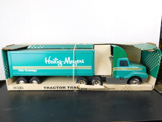 ERTL HEILIG-MEYERS TRACTOR TRAILER, IN ORIGINAL PACKAGE