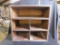 WOODEN BOX WITH FOUR CUBIES AND ONE OPEN SHELF