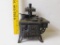 CAST IRON MINIATURE STOVE WITH PANS, 