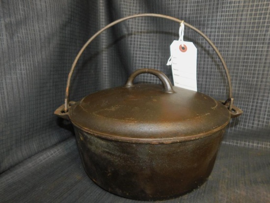 GRISWOLD NO. 8 CAST IRON DUTCH OVEN ERIE #833 WITH TRIVET #188 WITH CAST IRON LID ERIE #2551A