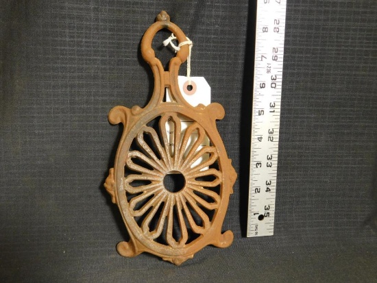 CAST IRON TRIVET, T234