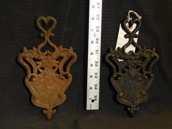 CAST IRON TRIVETS (2), MARKING NOT READABLE