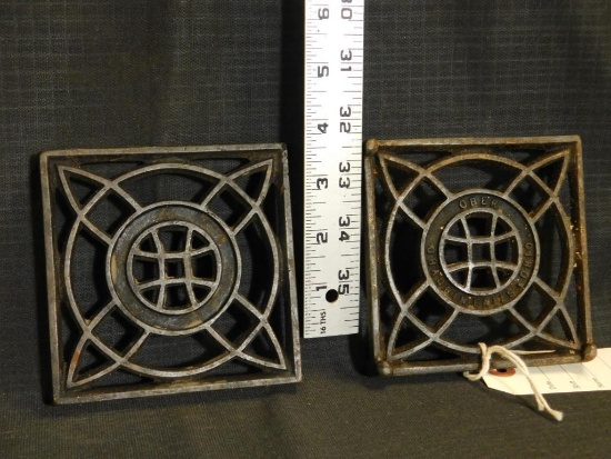 CAST IRON TRIVETS (2), OBER CHAGRIN FALLS OHIO