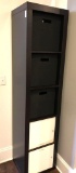 Tall Cube Cabinet with 3 baskets and two doors. Contents.