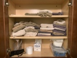 Spa Waxing station supplies, towels, cloths, disinfectant.