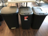 Three Plastic Trash Cans with Lids