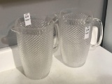 Two Clear Glass Water Pitchers