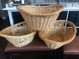 Three wicker laundry baskets