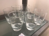 Eight clear glass drink tumblers