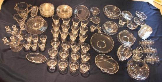 Large collection of clear glass Fostoria sets and dishes.