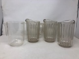 Four Plastic Pitchers