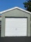 UTILITY SHED 10' x 16', with overhead door.