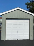 UTILITY SHED 10' x 16', with overhead door.