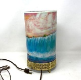 Lighted Cylinder Waterfall Scene