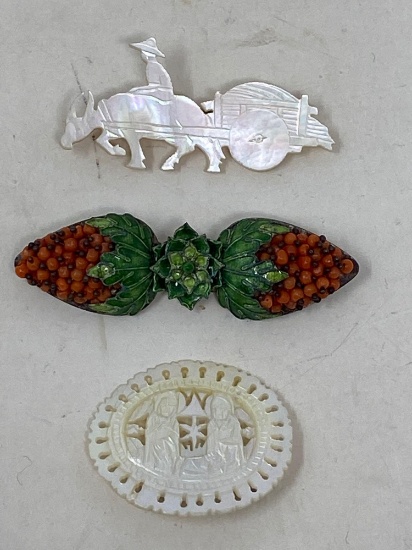 Three Brooches