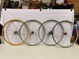 Four Antique Bicycle Wheels